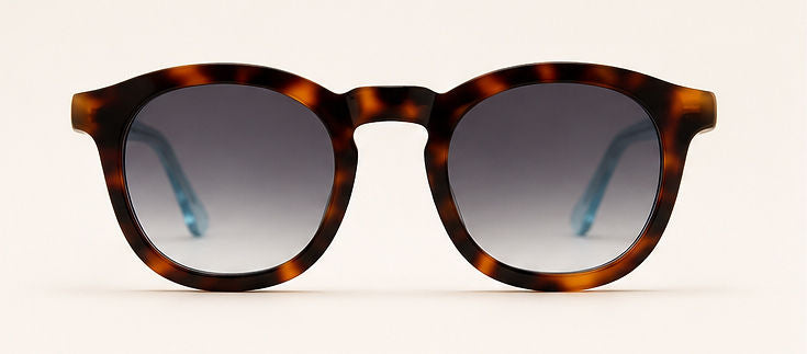 Wink & Nod Amalfi sunglasses in Havana with translucent blue temples, gray lenses — front view