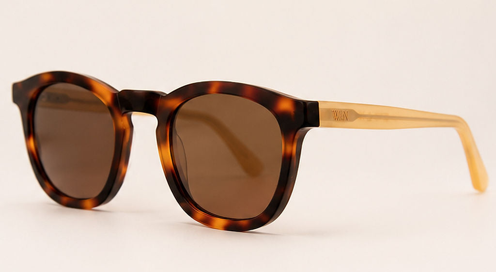 Wink & Nod Positano sunglasses in Havana with frosted amber temples, brown lenses — three-quarter view
