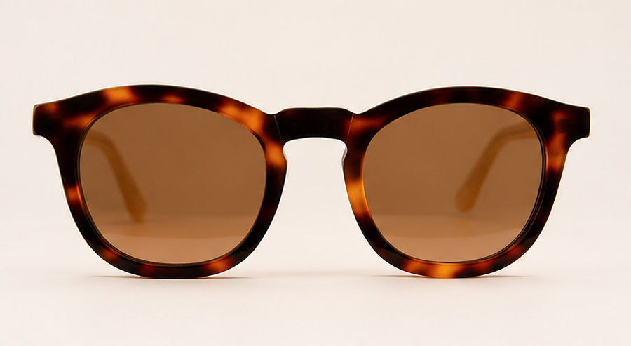 Wink & Nod Positano sunglasses in Havana with frosted amber temples, brown lenses — front view