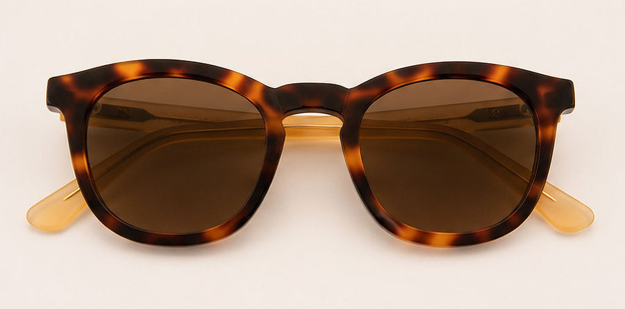 Wink & Nod Positano sunglasses in Havana with frosted amber temples, brown lenses — interior view