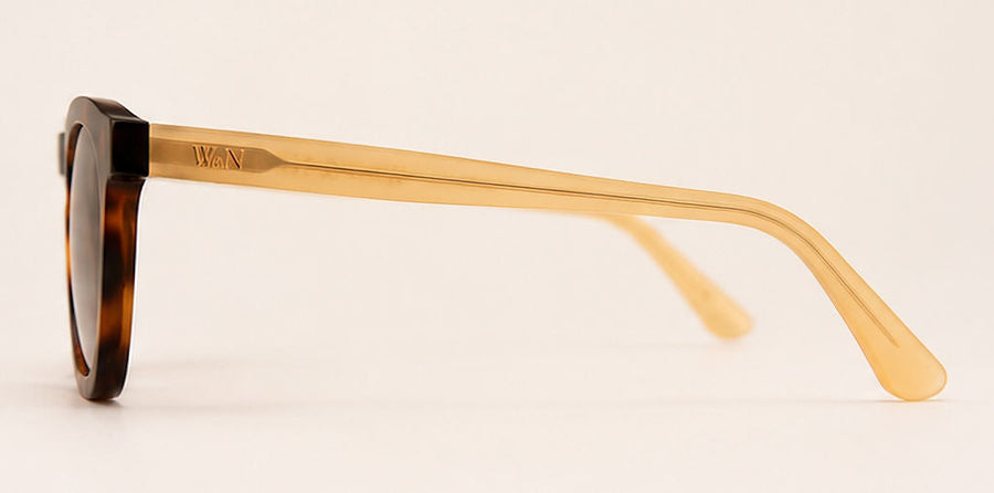 Wink & Nod Positano Sun Readers in Havana with frosted amber temples, brown lenses — left side profile